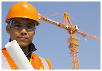 construction worker in front of a sky crane