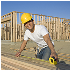 carpenter measuring lumber