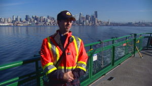 Male worker on ferry boat